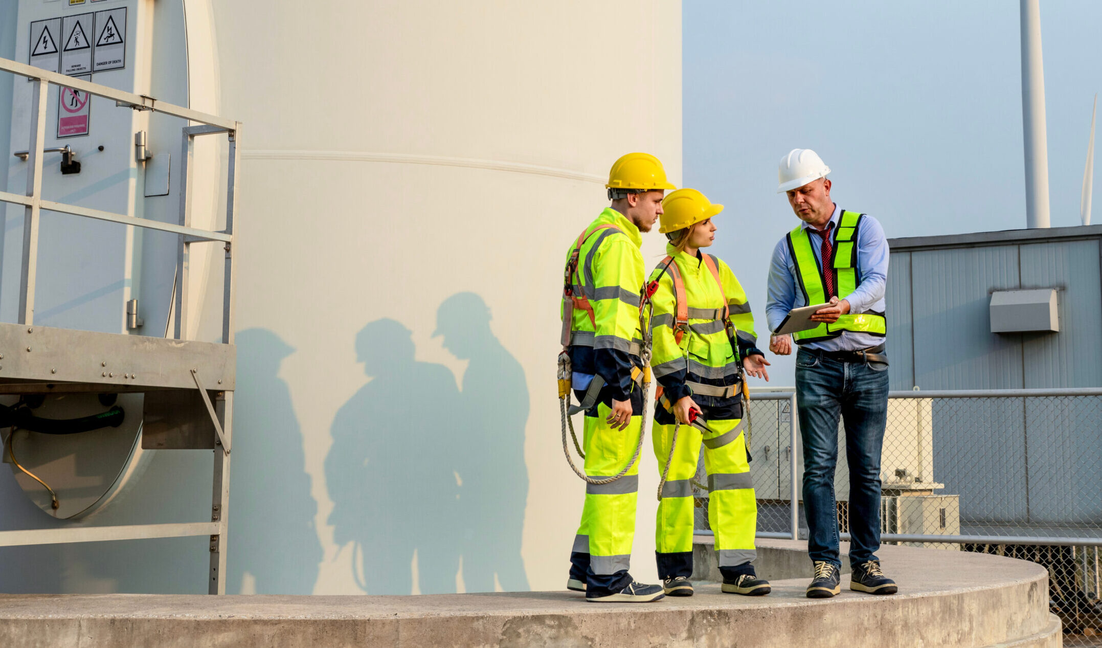 Three service technicians in the field.