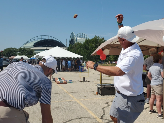 MSI Data employees playing cornhole.