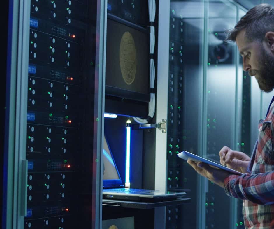 A technician inspecting vitals at a data terminal